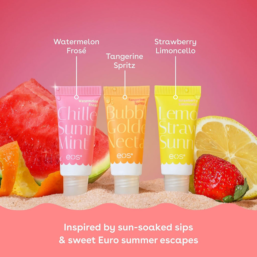 Three eos lip balm tubes with flavors 'Watermelon Froèsé', 'Tangerine Spritz', and 'Strawberry Limoncello' surrounded by fruit on a pink background.