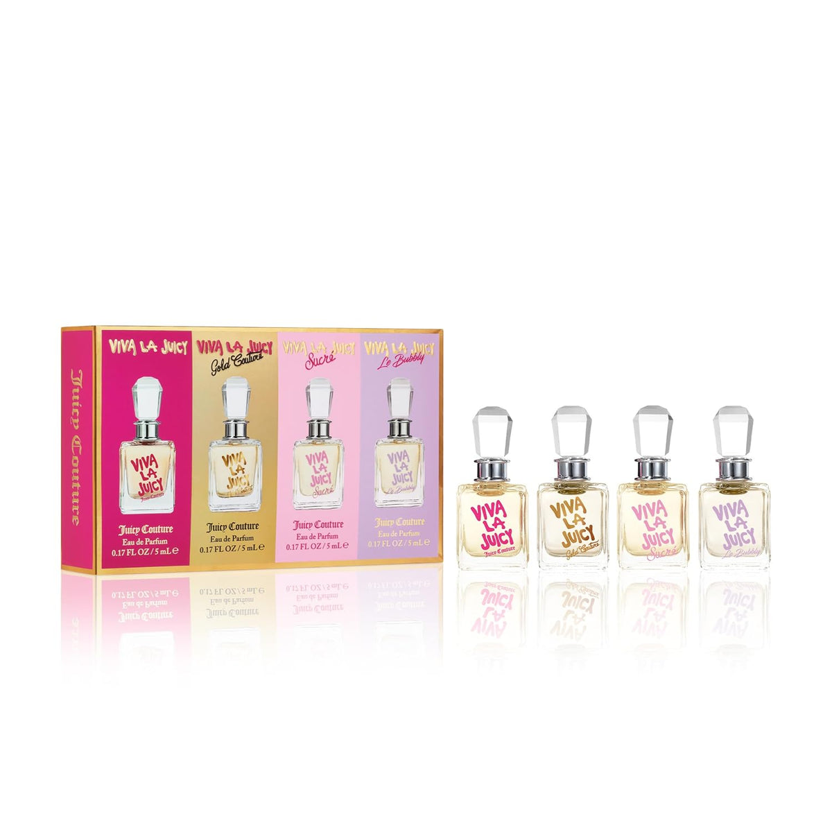 A boxed set of four Juicy Couture 'Viva La Juicy' perfume sample bottles displayed on a white reflective surface. The pink and lavender box shows the fragrance name, and the four clear bottles with silver caps and pale yellow liquid are lined up beside it.
