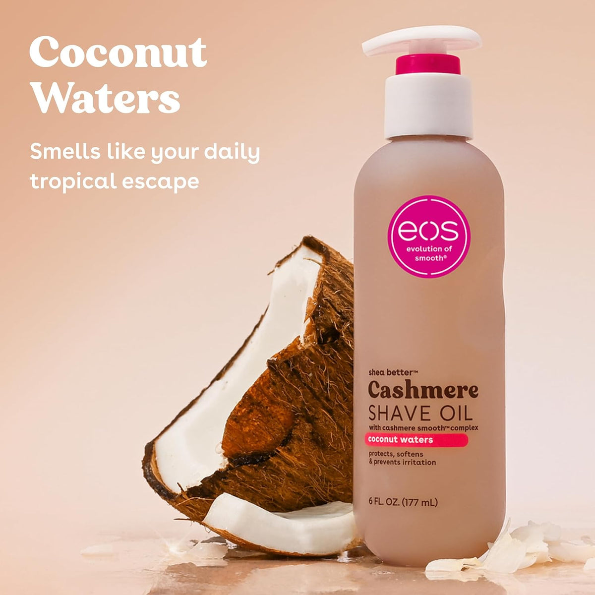 EOS Cashmere Shave Oil bottle with coconut next to it on a beige background