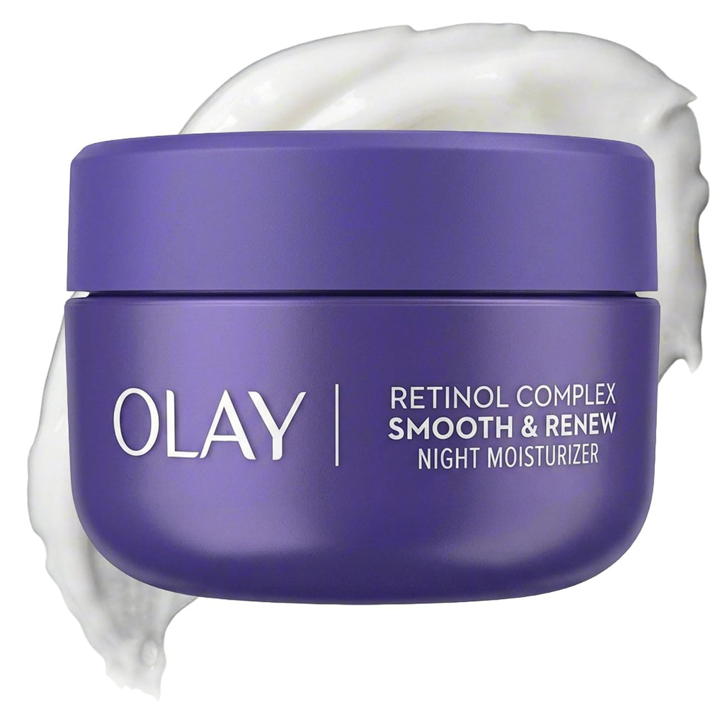 Olay Retinol Complex Smooth & Renew Night Moisturizer in a purple jar with white text, shown with a swirl of white cream behind it on a white background.