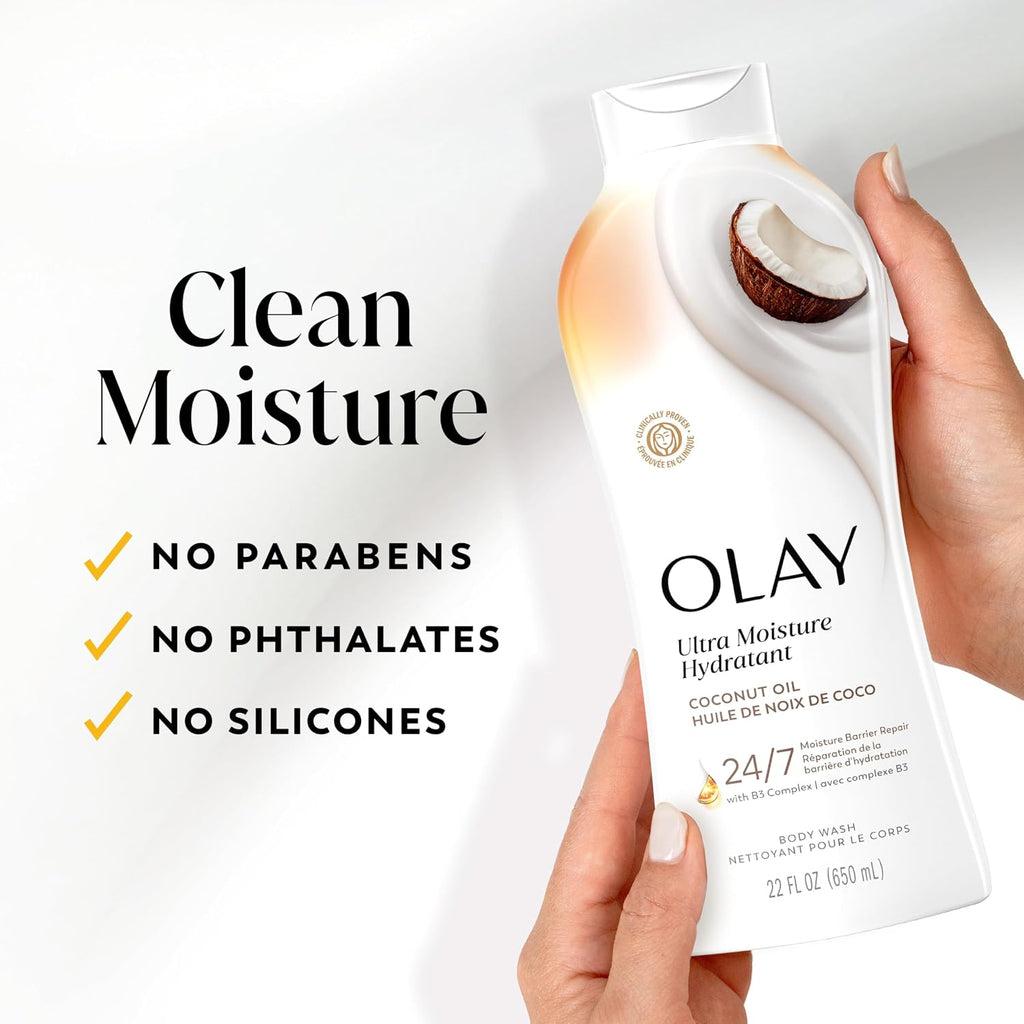 A hand holds an Olay Ultra Moisture Hydrating body wash bottle against a clean white background, with marketing text on the left reading 'Clean Moisture' and bullet points about no parabens, phthalates, and silicones.