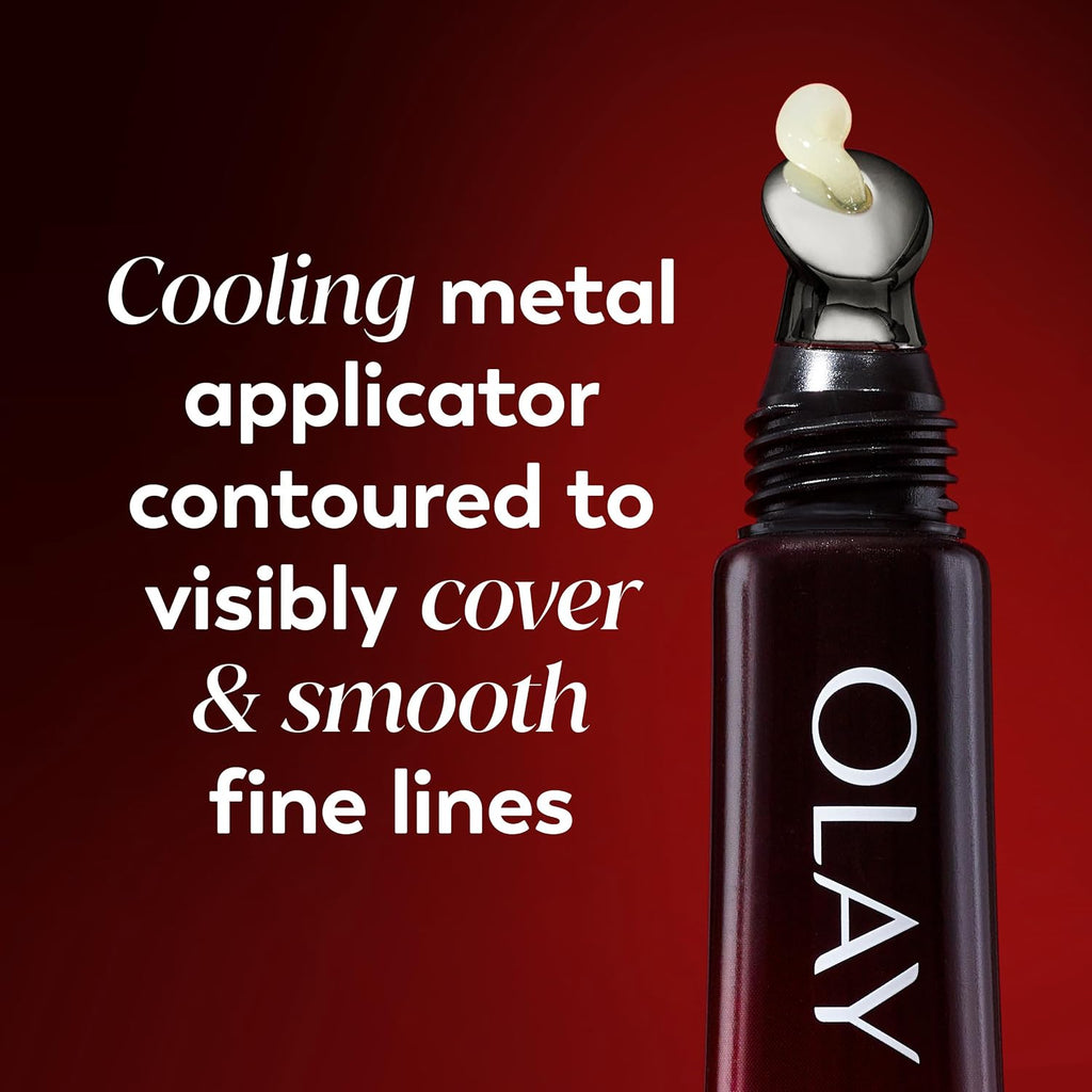 Olay skincare product with cooling metal applicator on a red background