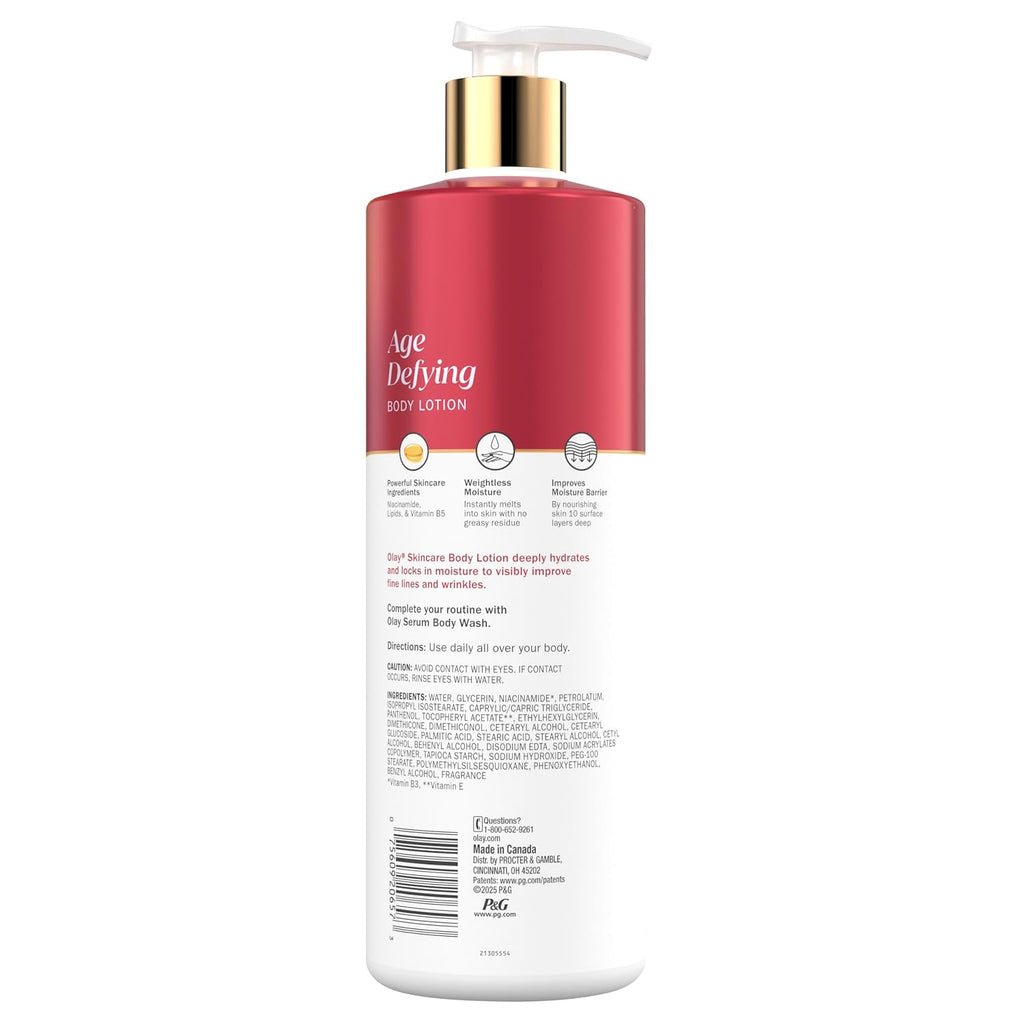 Body lotion bottle with red label and gold pump on a white background