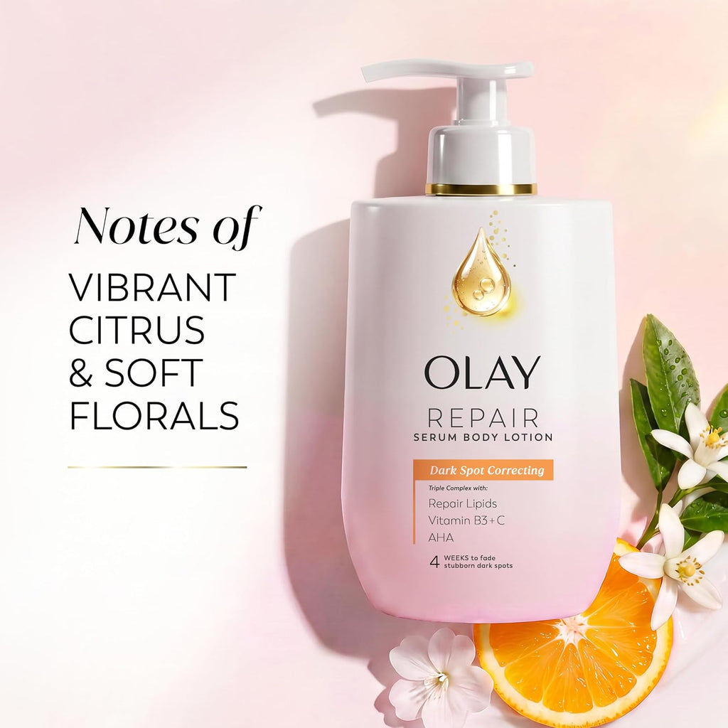 Olay Repair Serum Body Lotion in a white pump bottle with a gold-accented label, styled on a soft pink background with citrus slices, white flowers, and text reading 'Notes of Vibrant Citrus & Soft Florals'.
