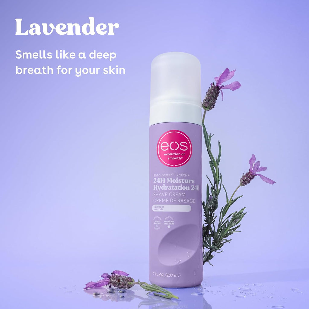 A bottle of EOS Lavender 24H Moisture Hydration Shave Cream stands on a reflective surface with lavender sprigs and text on a light lavender background.