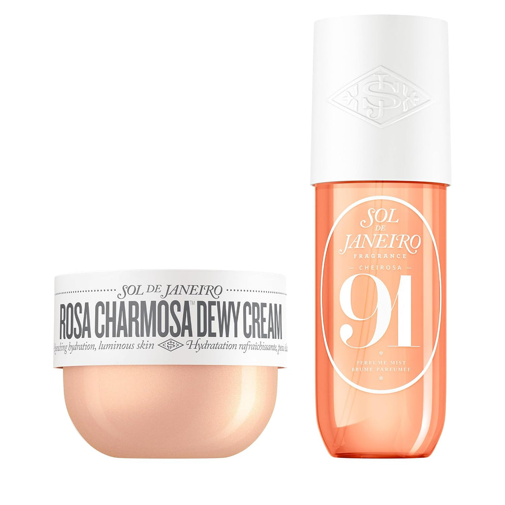 Sol de Janeiro skincare set featuring a jar of Rosa Charmosa Dewy Cream in a pale peach-beige shade and a matching orange bottle with a white cap, both labeled Sol de Janeiro Fragrance California 91.