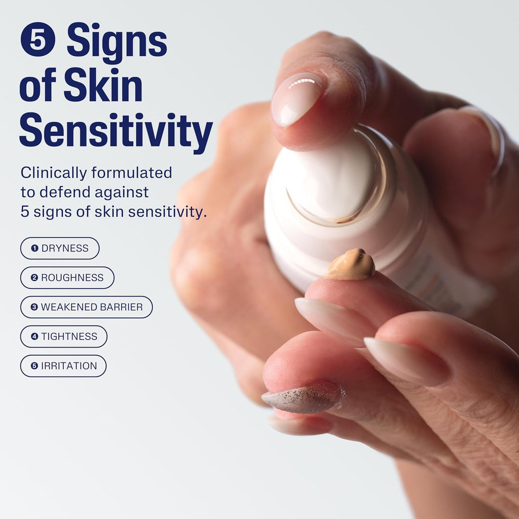 Hand holding a skincare product with text about skin sensitivity and product features.