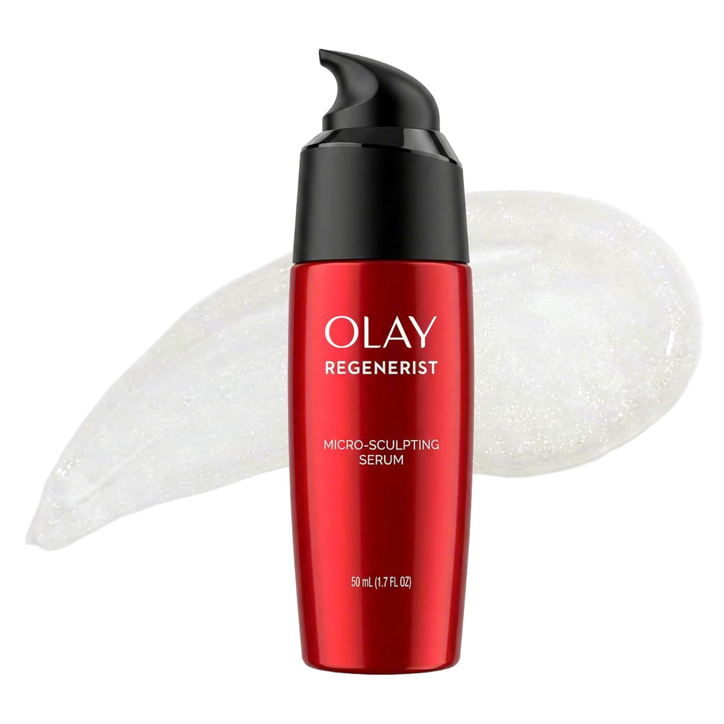 Olay Regenerist Micro-Sculpting Serum in a metallic red pump bottle with a black dispenser, shown against a white background with a translucent cream smear behind it.