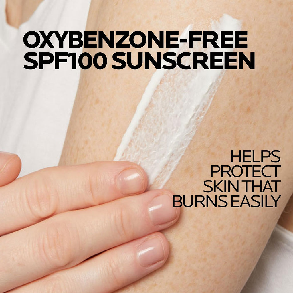 Sunscreen application on a person's arm with text about oxybenzone-free SPF100 sunscreen.