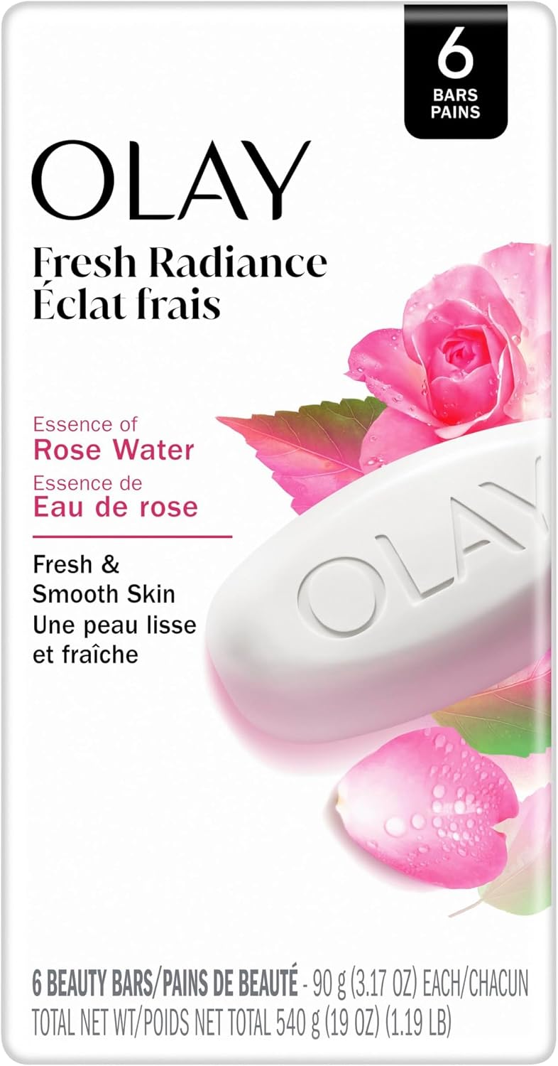 Olay Fresh Radiance bar soap packaging, featuring a white bar of soap with 'OLAY' embossed, pink rose water graphics, and a black '6 BARS PAINS' badge.