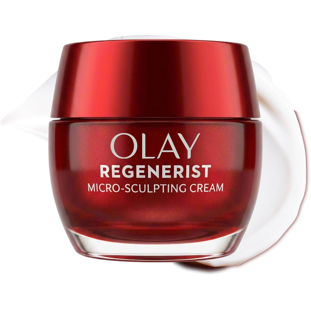 Olay Regenerist Micro-Sculpting Cream in a glossy dark red jar with a matching lid, shown on a white background with a white cream smear behind it.