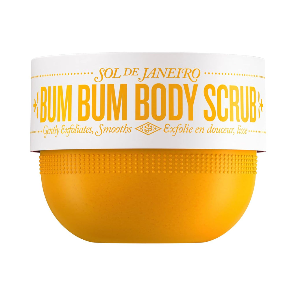 A jar of Sol de Janeiro Bum Bum Body Scrub with a white label and bright yellow-orange scrub visible inside, set against a plain white background.