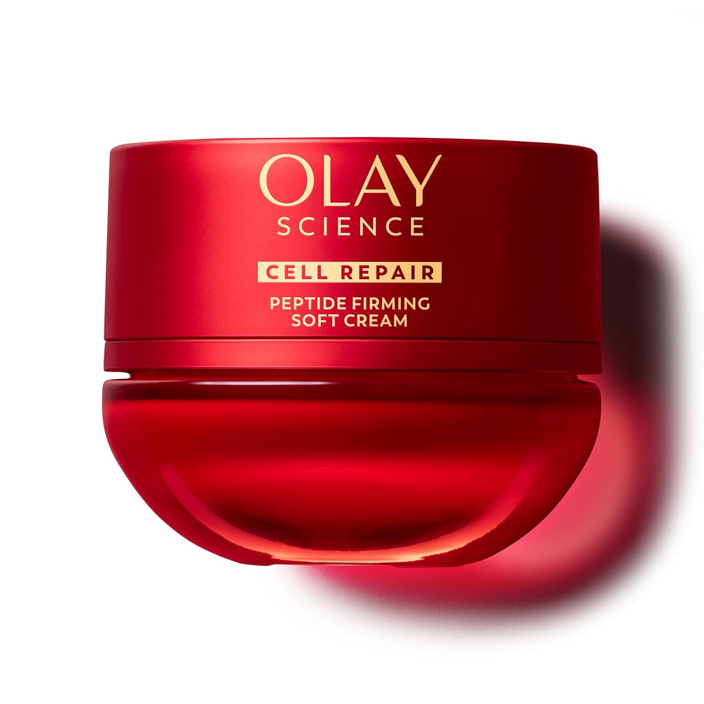 Red Olay cream jar with gold text on a white background