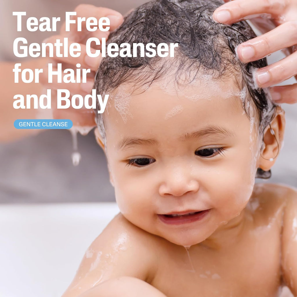 Baby being washed with text 'Tear Free Gentle Cleanser for Hair and Body' on a blurred background