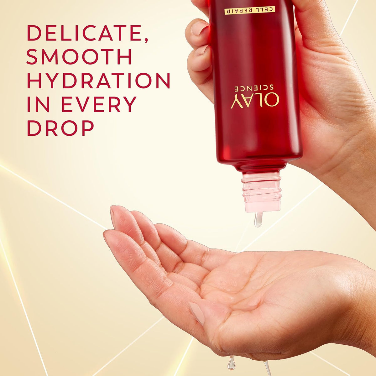 Hand holding a red Olay skincare product with text about hydration.