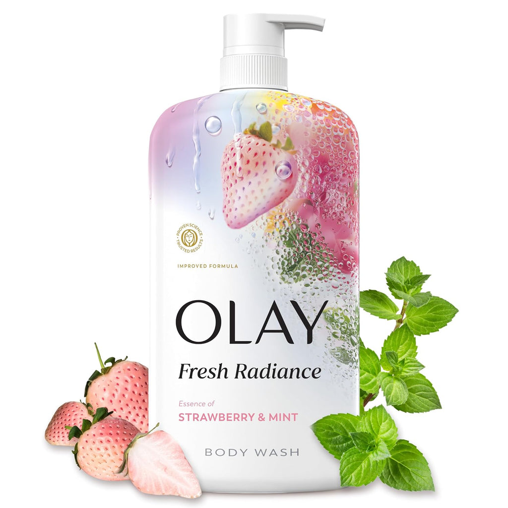 A bottle of Olay Fresh Radiance body wash with strawberry and mint graphics, shown with strawberries and mint leaves on a white background.