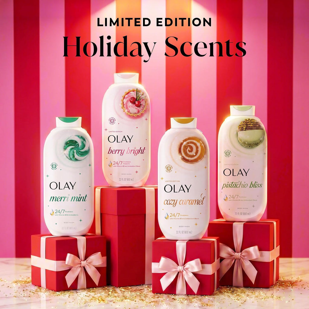 Four Olay body wash bottles displayed on red gift boxes against a pink striped background, with the text 'LIMITED EDITION Holiday Scents' at the top. The bottles are labeled merri mint, berry bright, crazy caramel, and pistachio bliss.