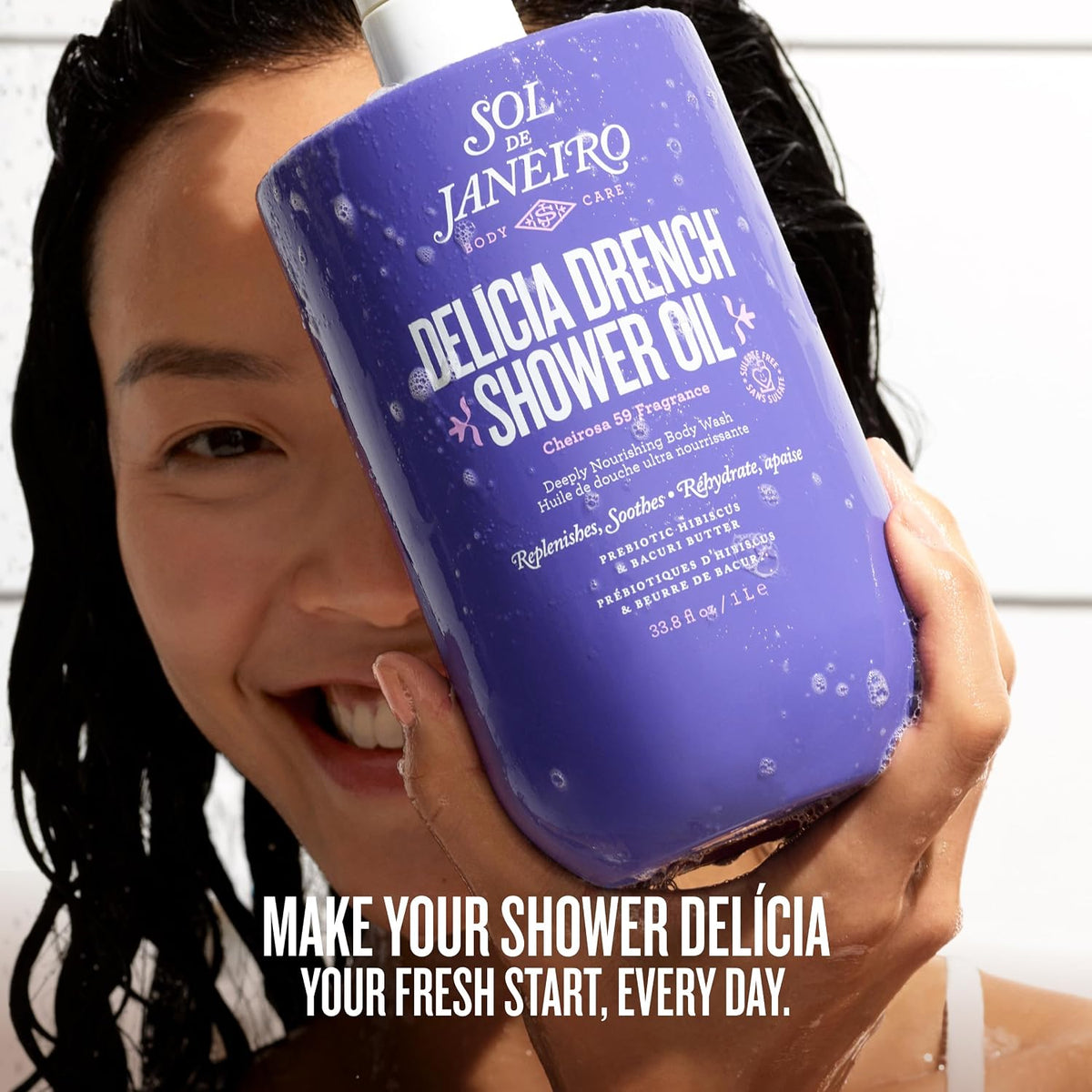 Person holding a purple bottle of Sol de Janeiro shower oil with text overlay.