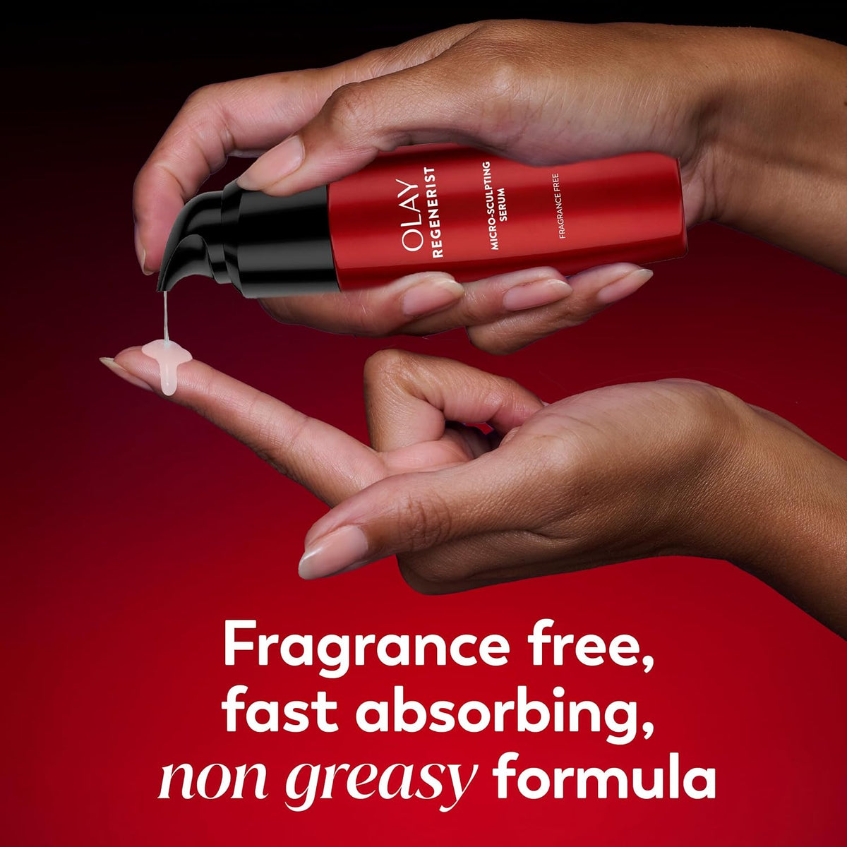 Hands holding an Olay Regenerist Liquid Cosmetic Glow pump bottle over a red background, with cream being dispensed onto a finger. White text at the bottom reads: 'Fragrance free, fast absorbing, non greasy formula.