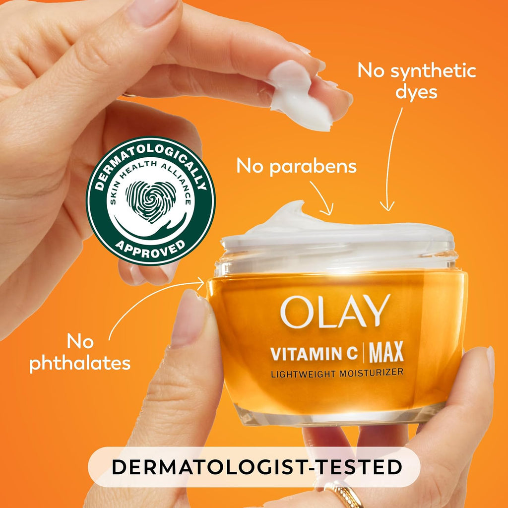 Olay Vitamin C Max moisturizer with hand holding cream and text highlighting ingredients on an orange background