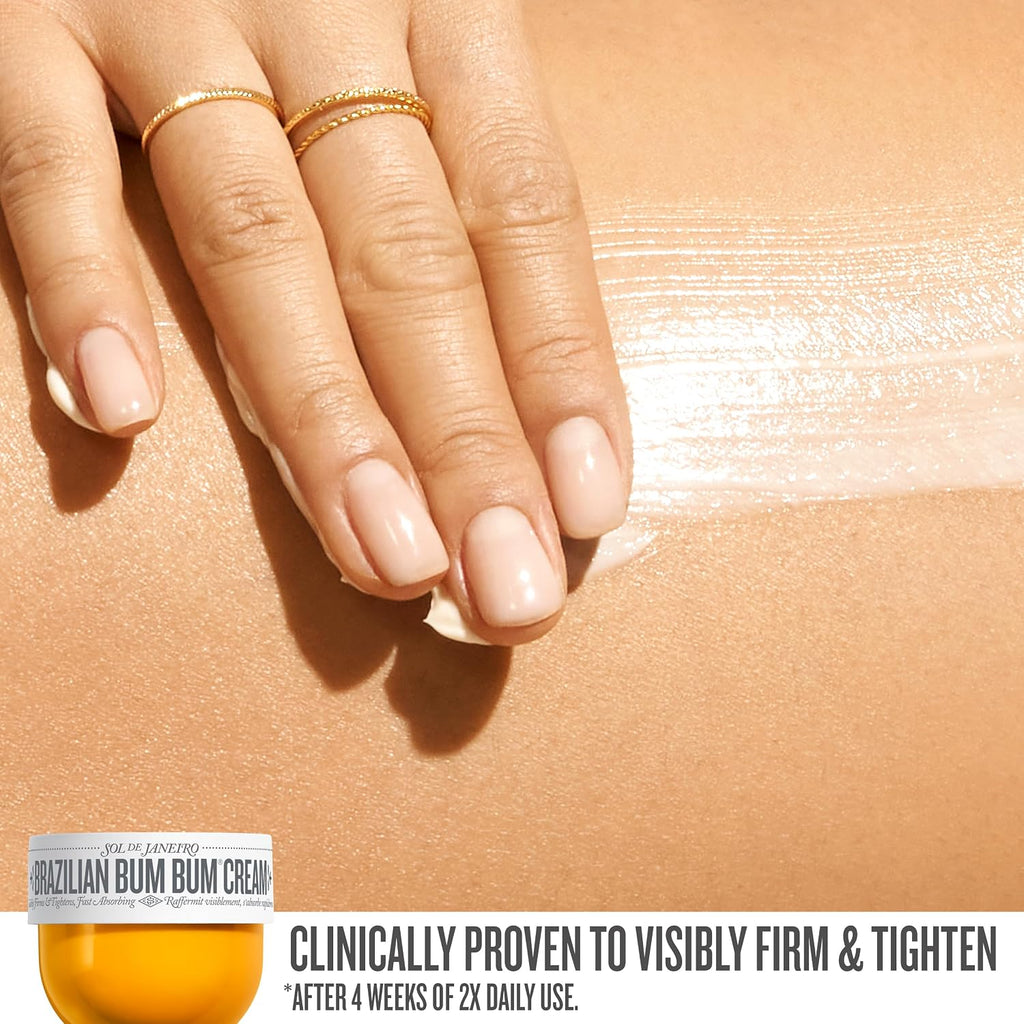 Hand applying Brazilian Bum Bum Cream to arm with product packaging in the corner.