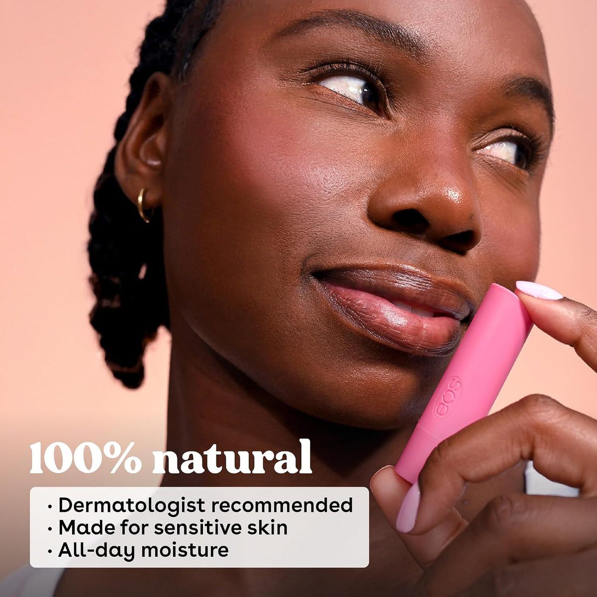 Woman applying pink lip balm with product details on a peach background