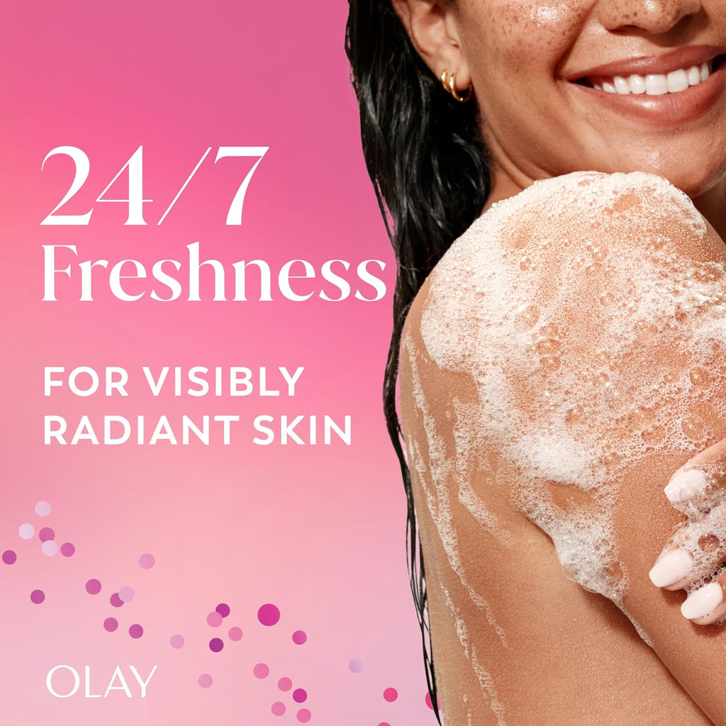 Woman with soapy skin on a pink background with Olay branding