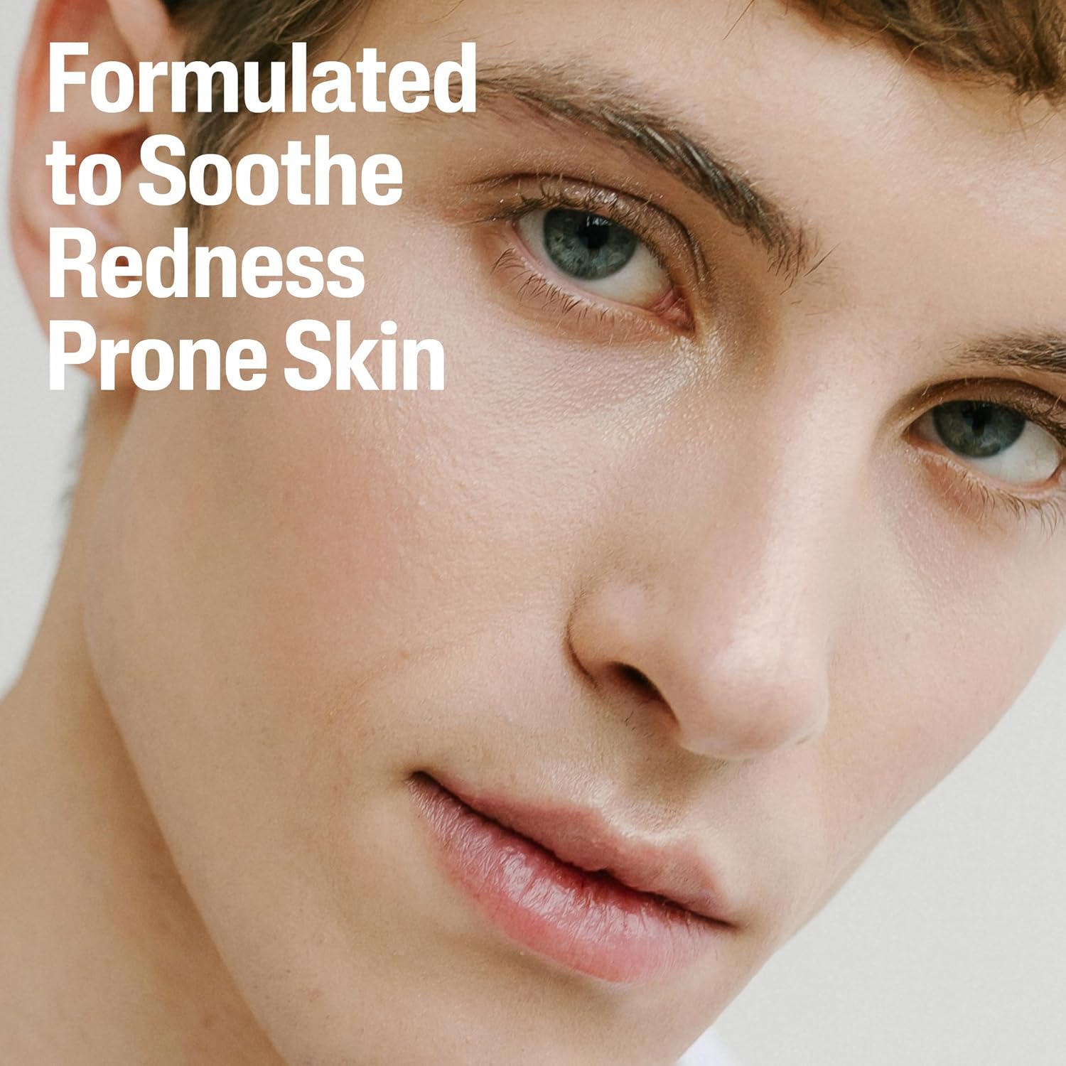 Close-up of a person's face with text 'Formulated to Soothe Redness Prone Skin' on a light background