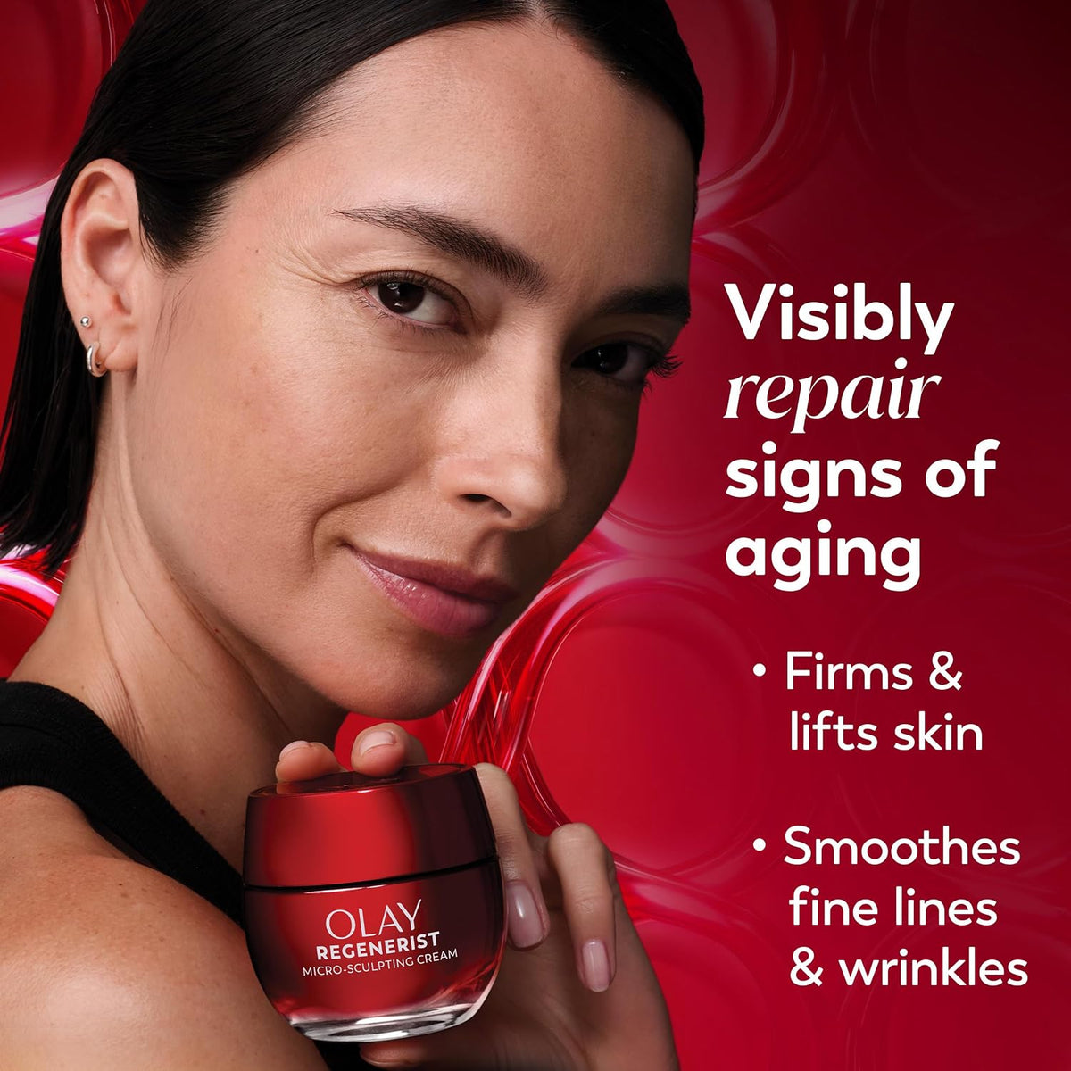 Woman holding an Olay Regenerist skincare product with promotional text on a red background