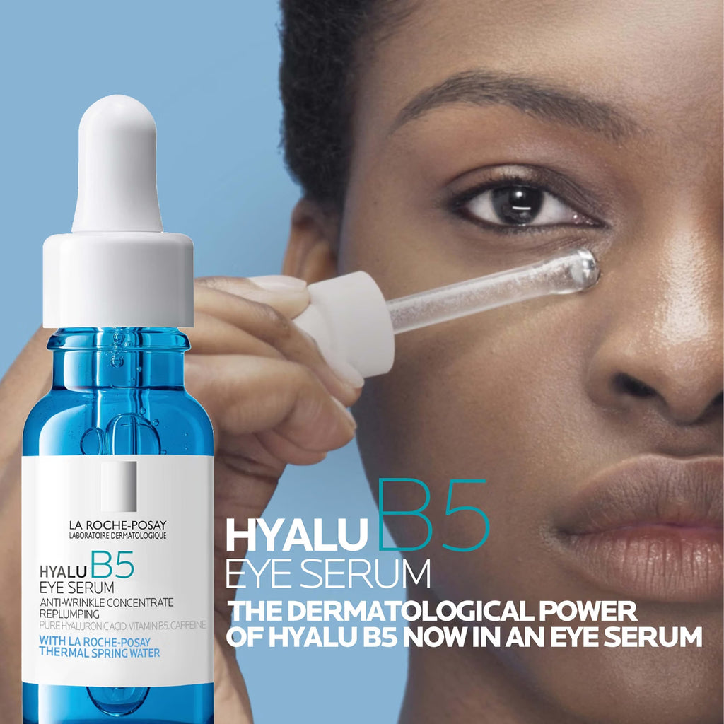 La Roche-Posay Hyalu B5 Eye Serum bottle shown next to a close-up of a woman applying the serum with its dropper to her eye, set against a solid blue background with promotional text.