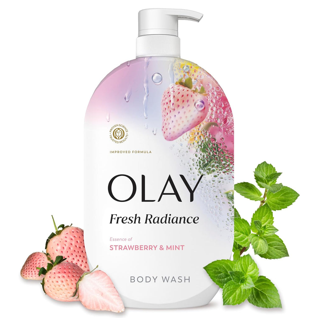 A bottle of Olay Fresh Radiance body wash with strawberry and mint graphics, styled with fresh strawberries and mint leaves on a white background.