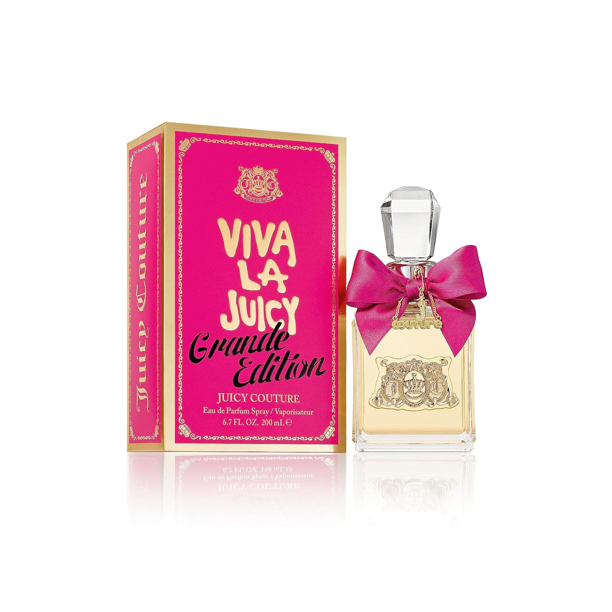 Juicy Couture Viva La Juicy Grand Edition perfume bottle with a pink bow next to its pink and gold packaging box on a white background.