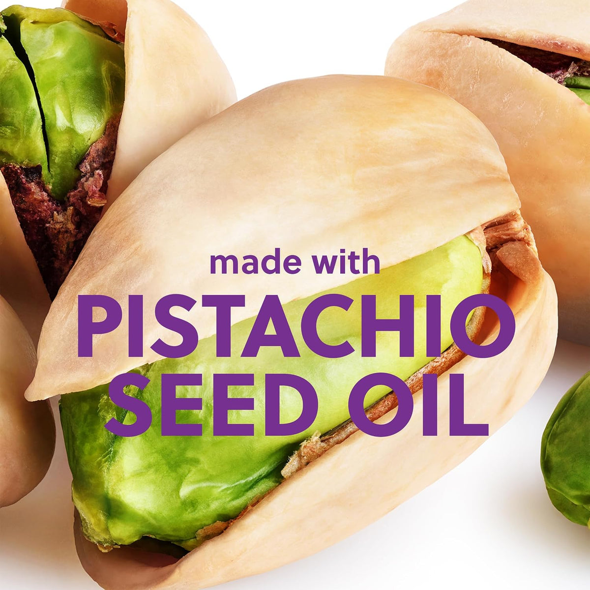 Pistachio nut with text 'made with Pistachio Seed Oil' on a white background