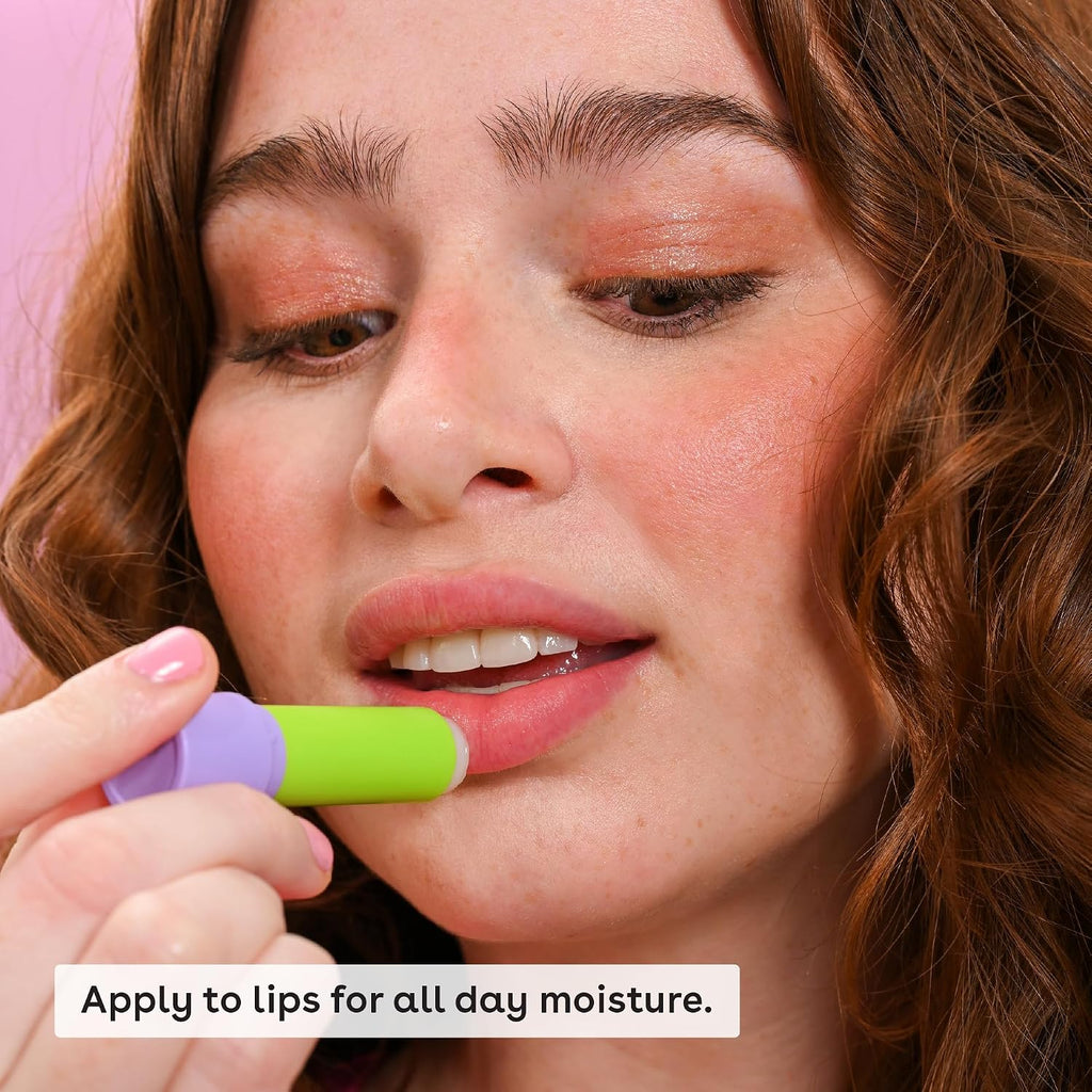 Person applying a lip balm with text 'Apply to lips for all day moisture.'