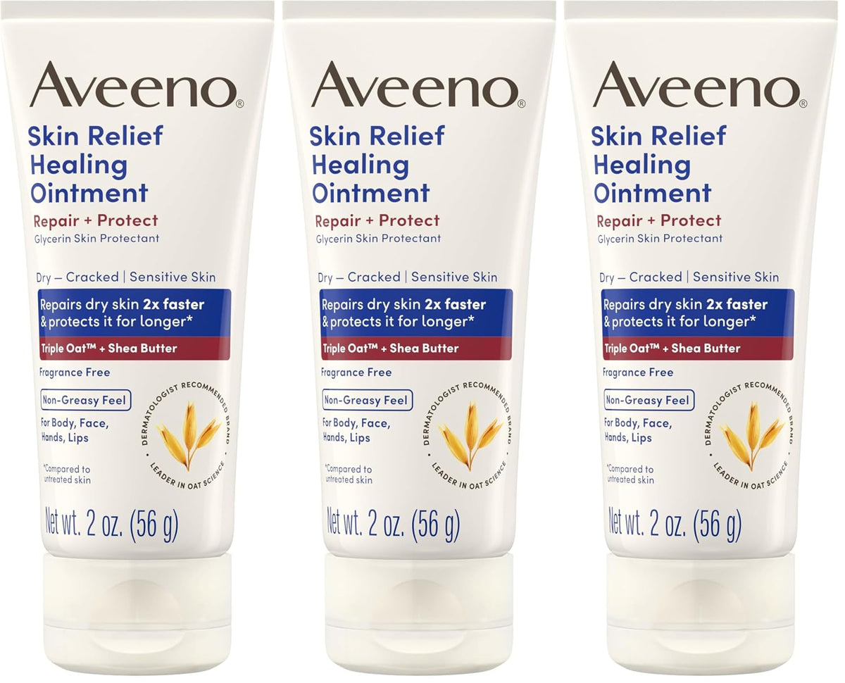 Three white tubes of Aveeno Skin Relief Healing Ointment arranged side by side on a white background.