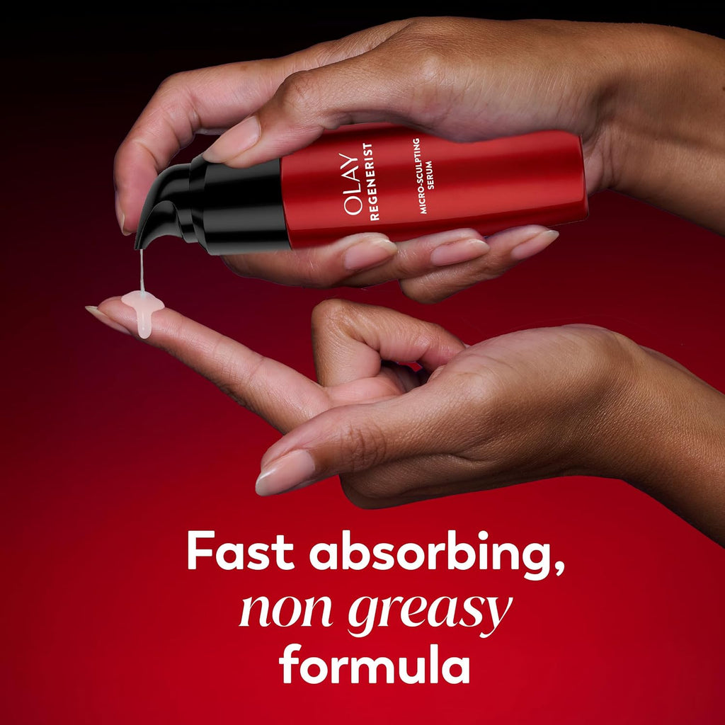 Olay Regenerist serum being applied to a hand with a red background