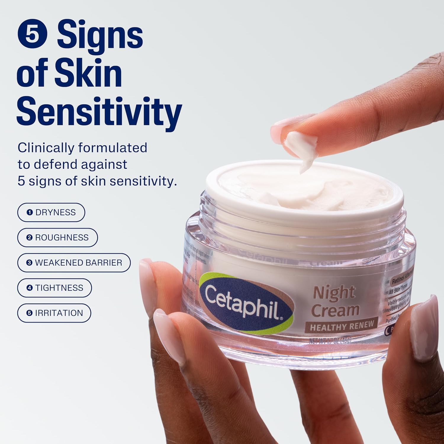 Cetaphil Night Cream jar with a hand applying cream, against a light gray background.