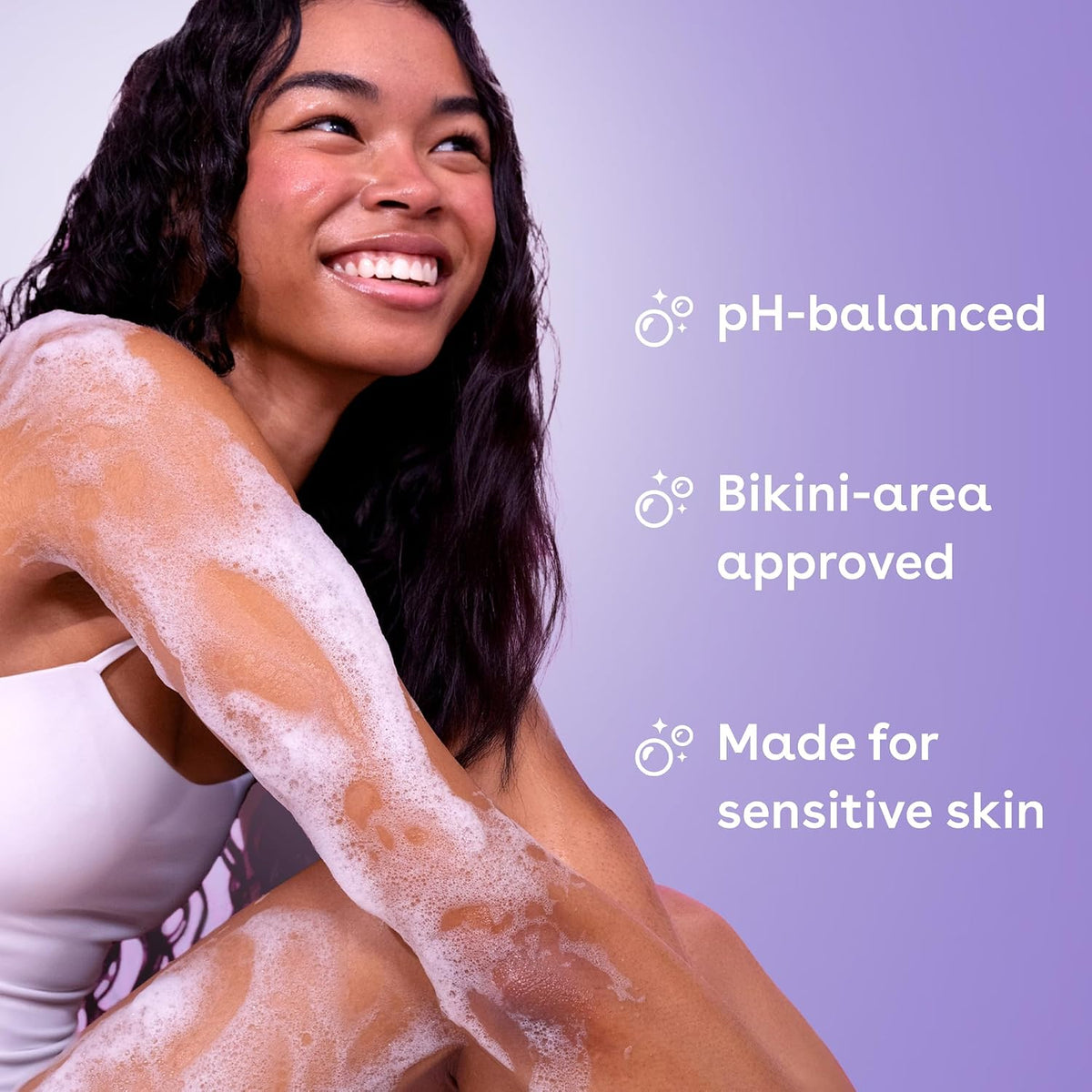 Woman with foamy product on her arm against a purple background with text about product features.
