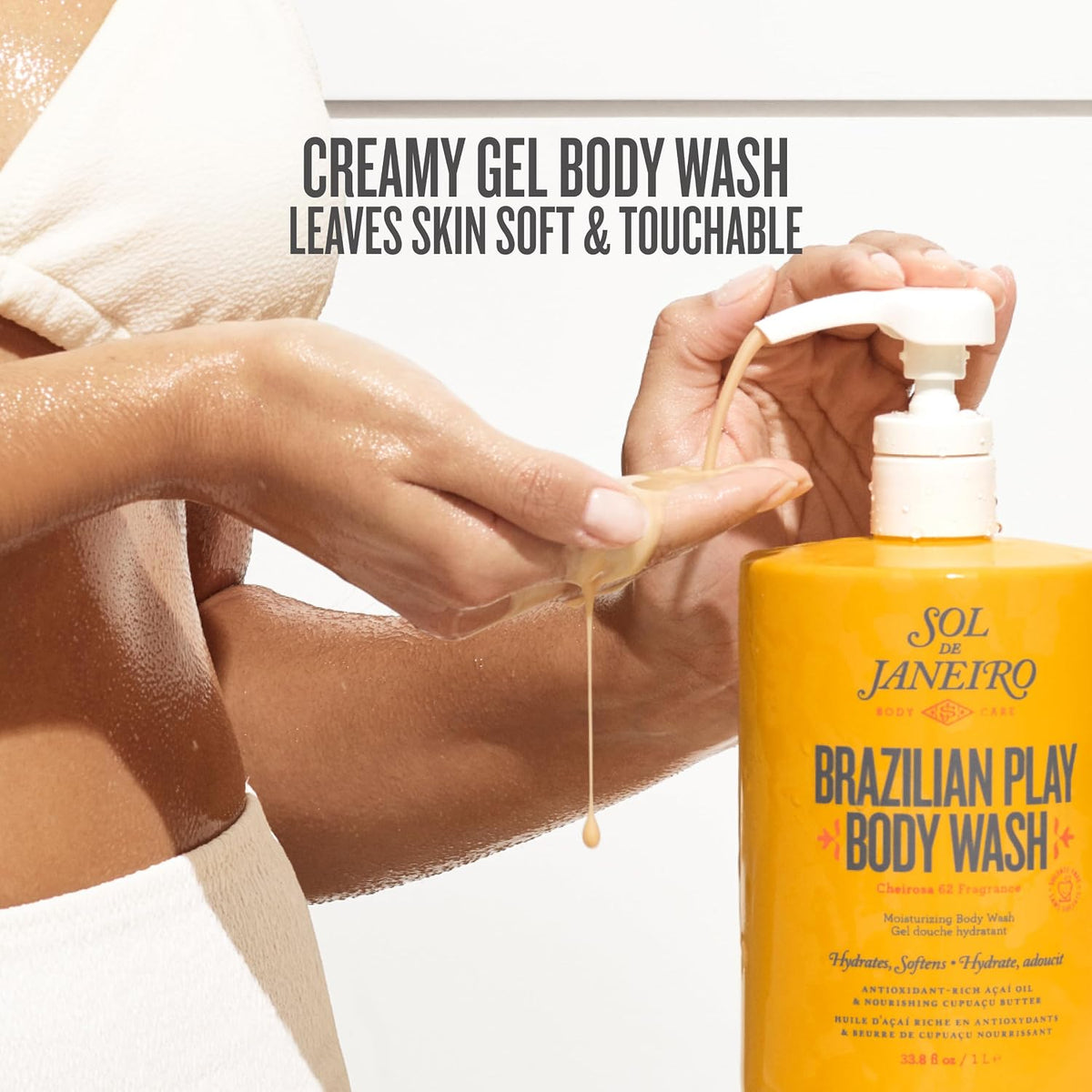Person applying Sol de Janeiro Brazilian Play Body Wash to their arm with a white background