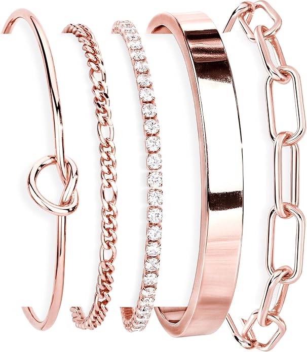 Set of rose gold bracelets with various designs on a white background