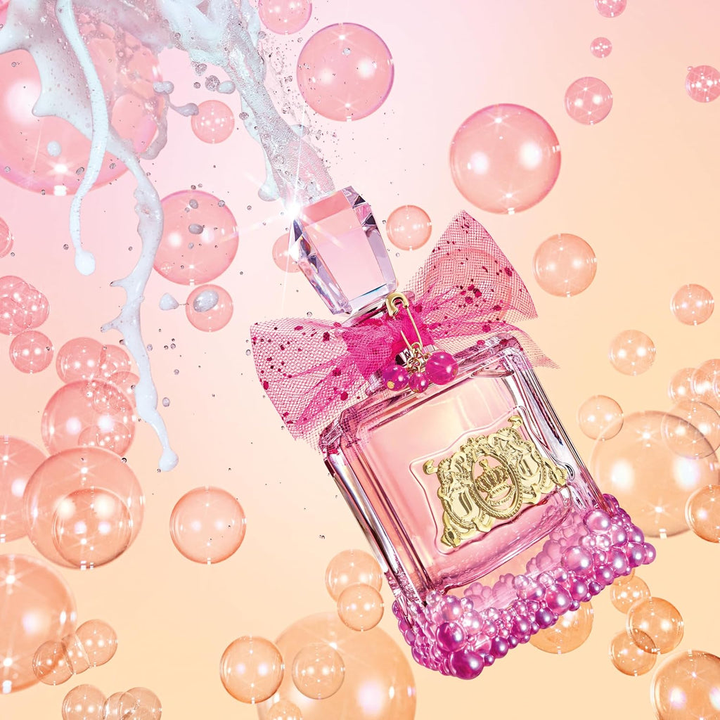 Pink perfume bottle with decorative bow on a bubble and pastel background