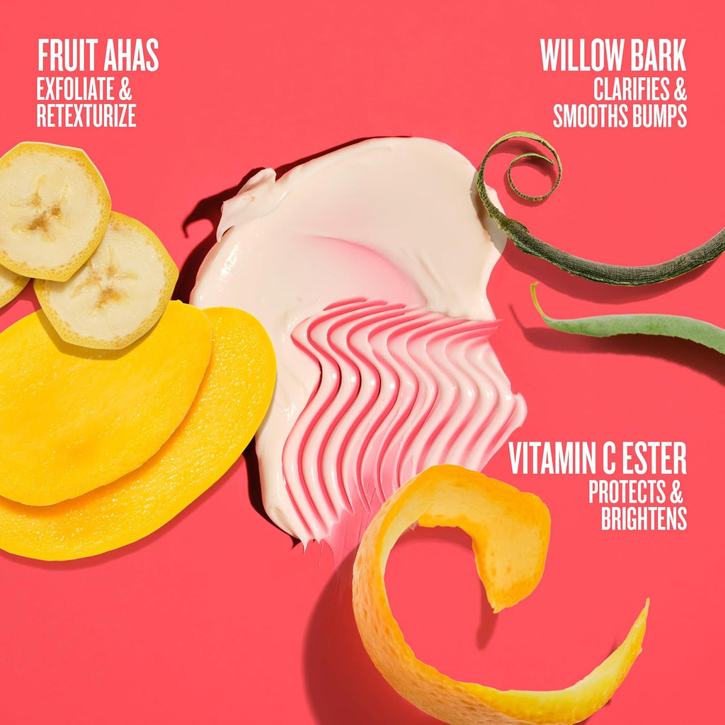 Skincare product with sliced fruits and bark on a pink background