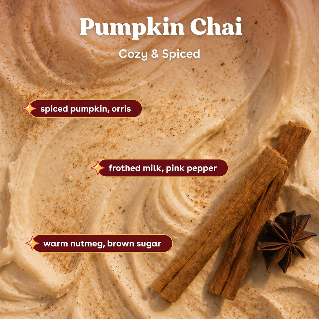 Pumpkin Chai latte art with text overlays reading 'Pumpkin Chai', 'Cozy & Spiced', and ingredient callouts for spiced pumpkin, orris; frothed milk, pink pepper; and warm nutmeg, brown sugar. The drink is presented in a creamy beige swirl pattern with cinnamon sticks and star anise on a dark brown background.