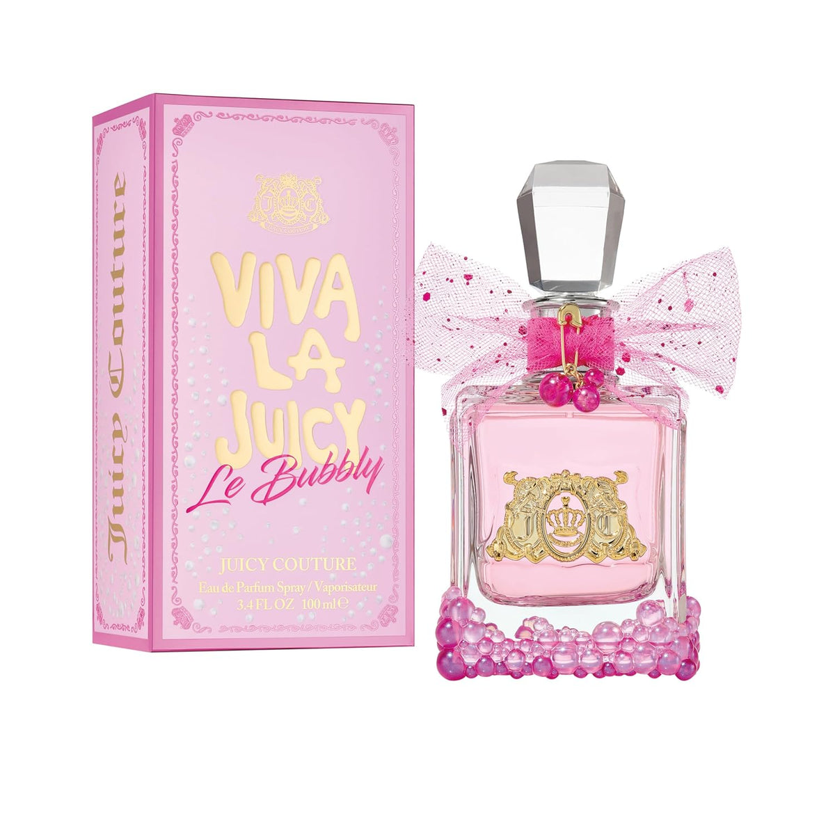 Juicy Couture Viva La Juicy Le Bubbly perfume bottle and its pink packaging box on a white background. The bottle is clear glass with light pink liquid, decorated with a pink bow, pink cherry embellishments, and a pink beaded base, featuring a gold crest emblem.