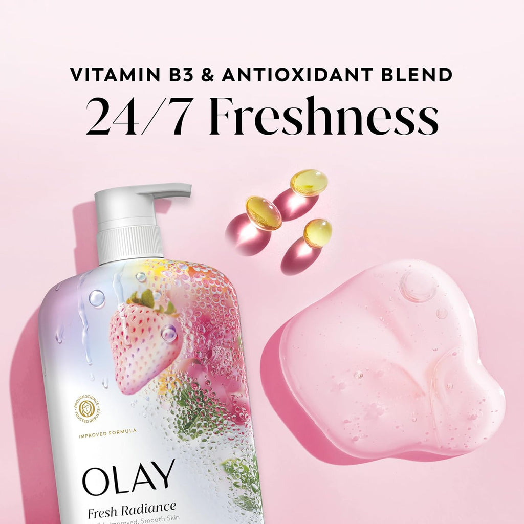 Olay Fresh Radiance bottle with strawberry design on a pink background, featuring text about vitamin B3 and antioxidant blend.