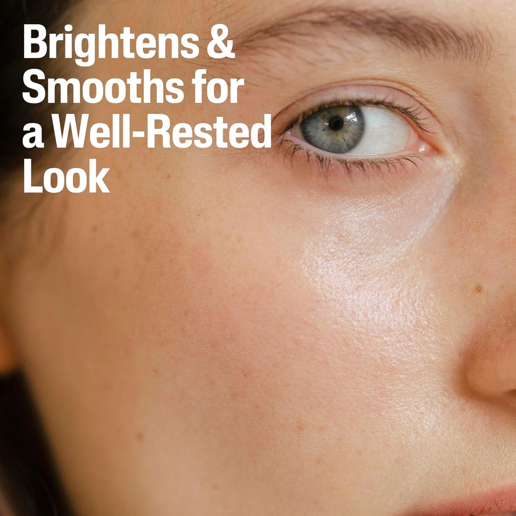 Close-up of a person's eye with text 'Brightens & Smooths for a Well-Rested Look' on a blurred background