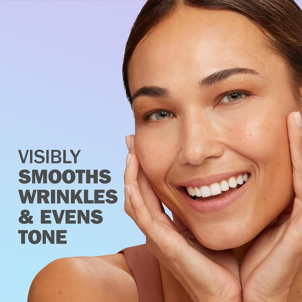 A smiling woman with smooth, radiant skin poses with her hands on her cheeks against a soft blue gradient background. Bold text on the left reads, 'VISIBLY SMOOTHS WRINKLES & EVENS TONE.