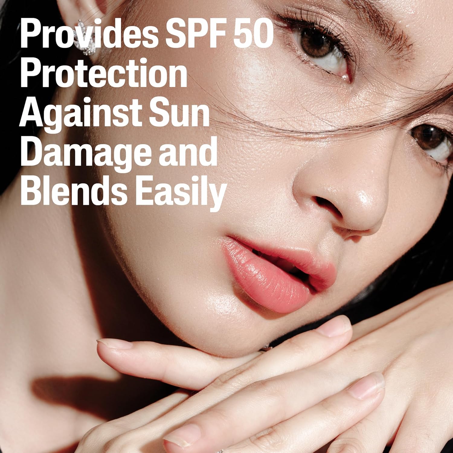 Woman's face with text about SPF 50 protection and easy blending.