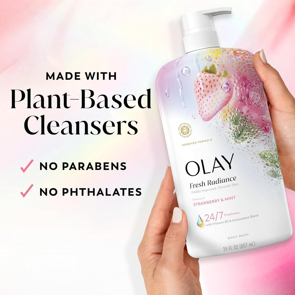 Olay Fresh Radiance cleanser bottle held by a hand with plant-based cleanser text on a gradient background