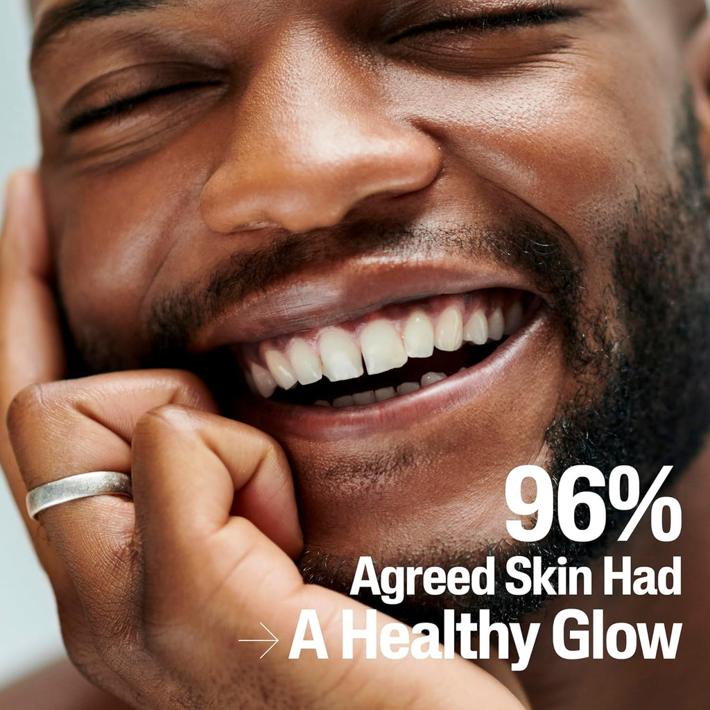 Man with a healthy glow on his skin, smiling with a hand on his chin, and text indicating 96% agreed skin had a healthy glow.